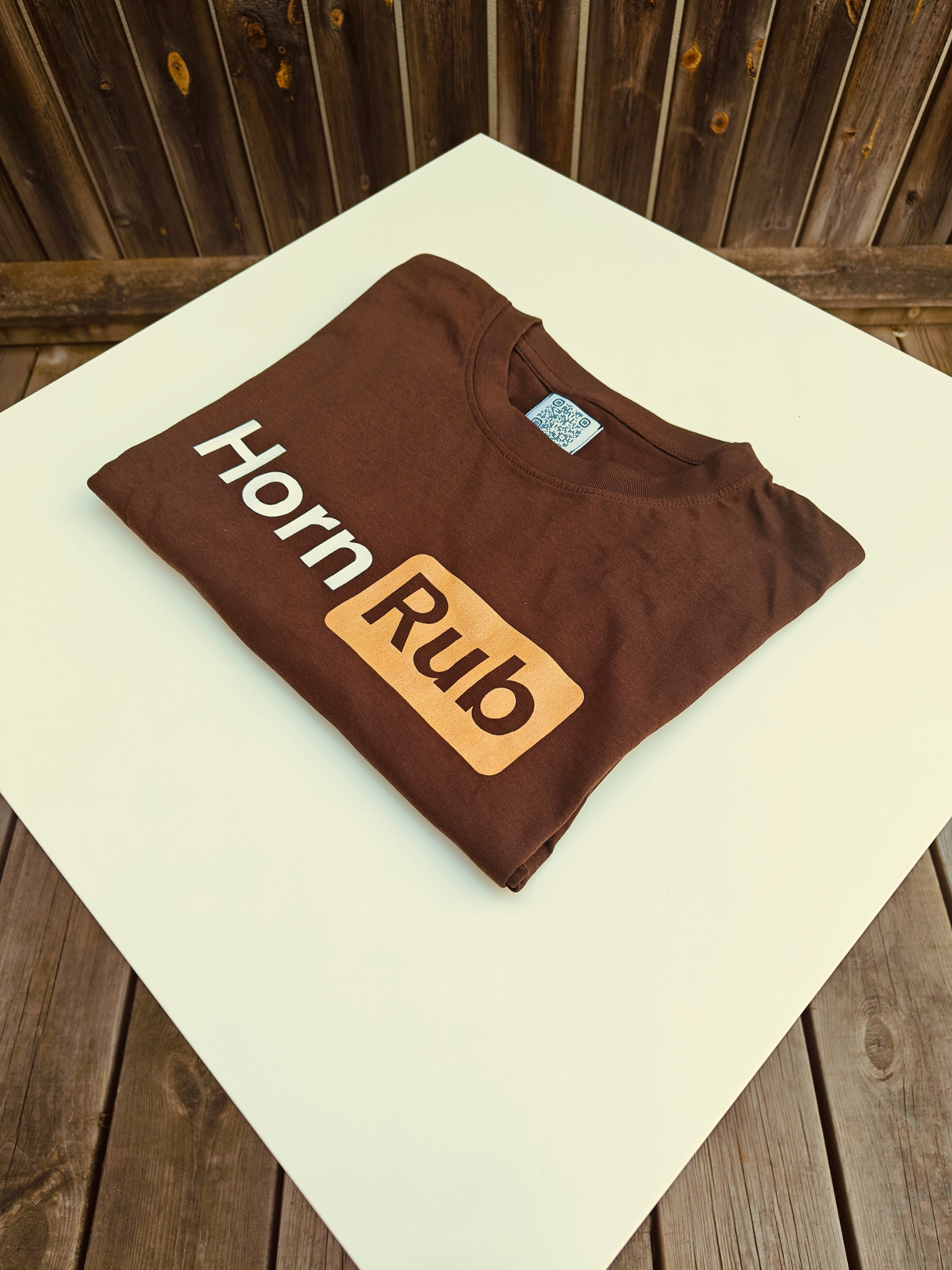 HornRub Parody Logo Dark T-Shirt Fold Display – Adult Humor Streetwear Unisex Tee